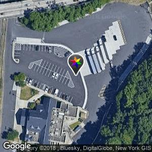 Parking lot facing the tractor trailers