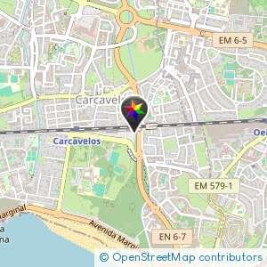 Estacionamento terra batida ao fundo