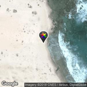 On beach behind California Lighthouse